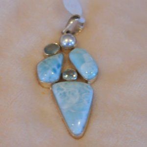 Silver pendant with 3  blue Larimar gemstones